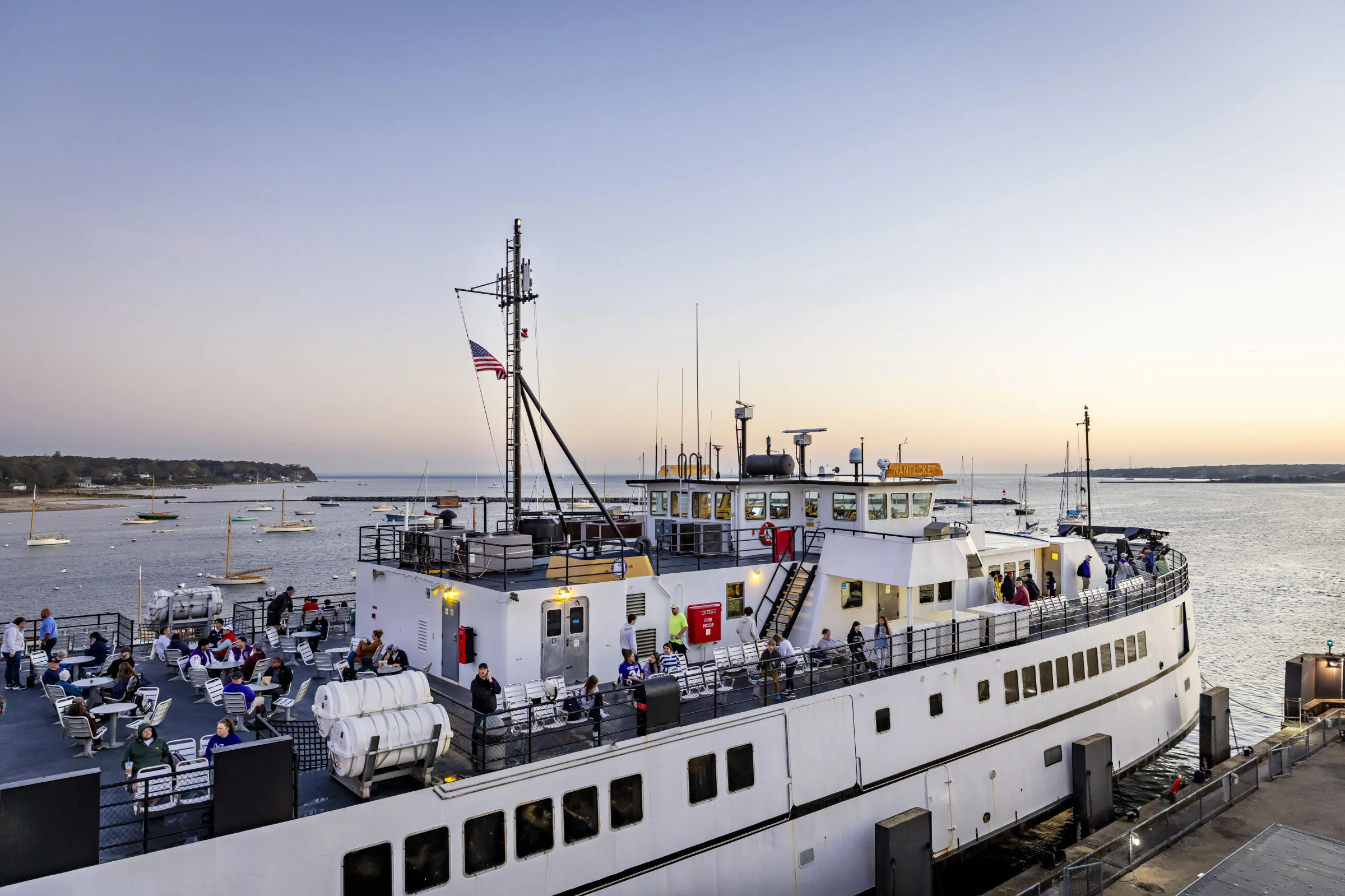 Martha's Vineyard ferry on the water in fall light — a short-weekend arrival